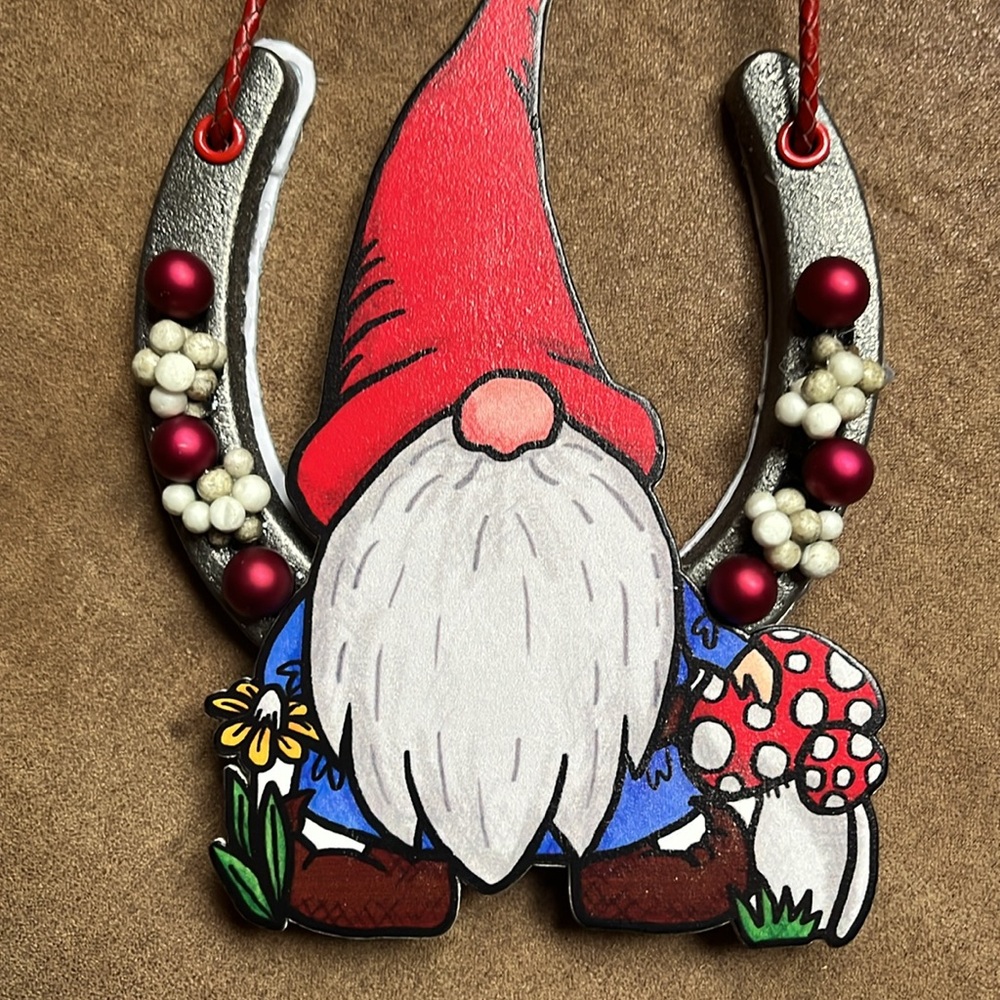 Handmade Gnome Ornament with Red Hat and Mushroom hanging with metal horseshoe